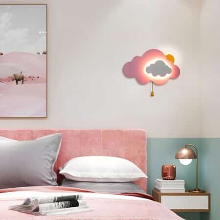 Cloud and sun wall lamp with pull cord on a wall in a child's bedroom
