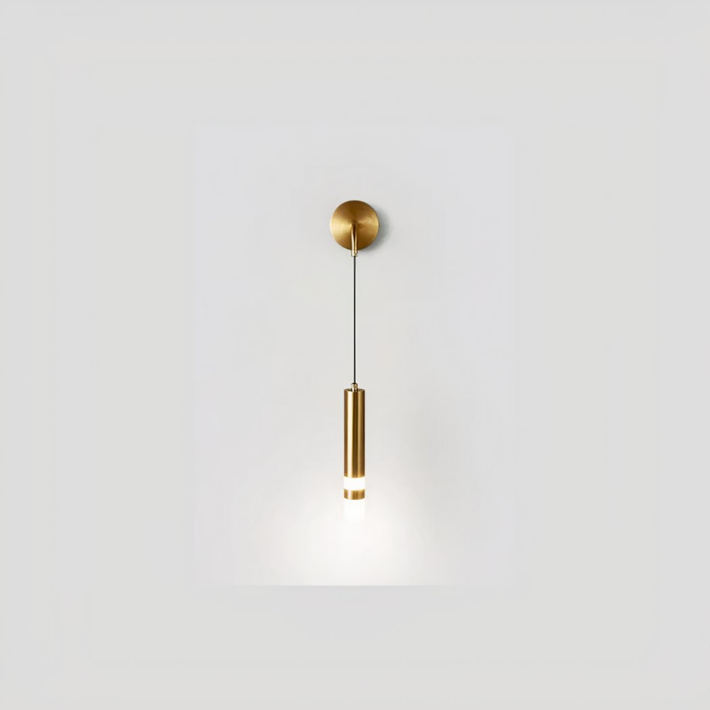 Suspended wall light in gold with hanging tube.