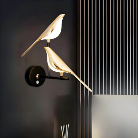 Wall lights with two golden magpies and touch-sensitive switch in a contemporary living room
