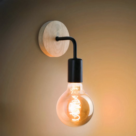 minimalist black wall light with large light bulb