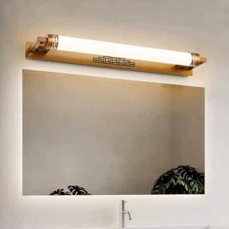 above a mirror in a bathroom is a brown neon wall light with a Chinese motif