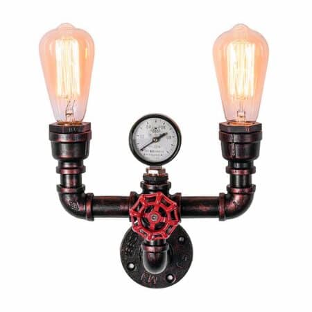 Industrial wall sconce in the form of metal water pipes and valves with double outlet, red knob in front and pressure meter above. One outlet on each side with a light bulb on a white background.