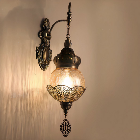 A retro oriental wall lamp lit on a wall