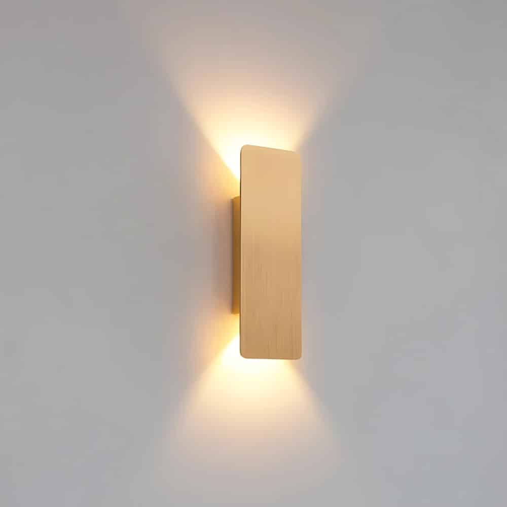 Rectangular LED wall lamp in metal, diffusing soft light upwards and downwards for elegant, modern lighting.